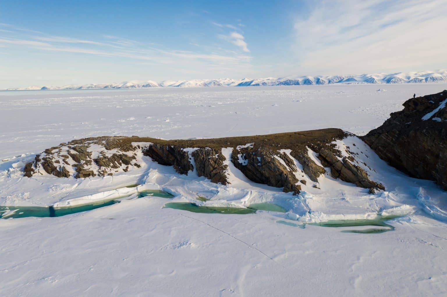 Yukon Noord Canada NU Sirmilik National Park rotskust met ijs en open water